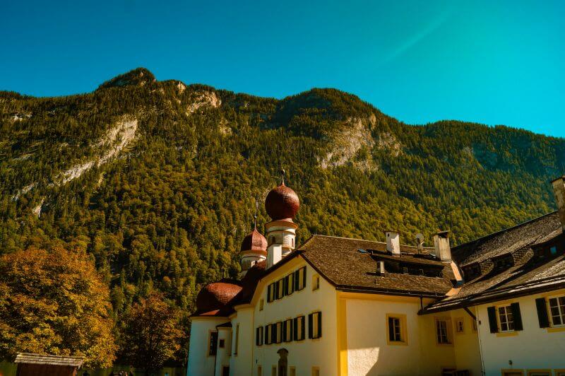 Koenigssee sights: The red onion domes of the pilgrimage church st bartholomä
